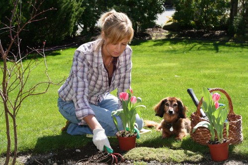 Garden worker following site safety procedures